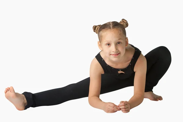 Hermosa mujer haciendo yoga sobre fondo blanco —  Fotos de Stock