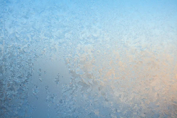 Mooie winter textuur patronen van vorst op een venster — Stockfoto