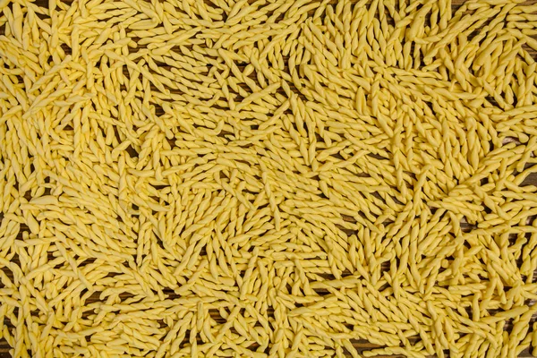 Appetizing italian pasta background image on wooden — Stock Photo, Image