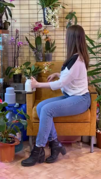 Beautiful Girl Gardener Caring Flowers Greenhouse — Stock Video