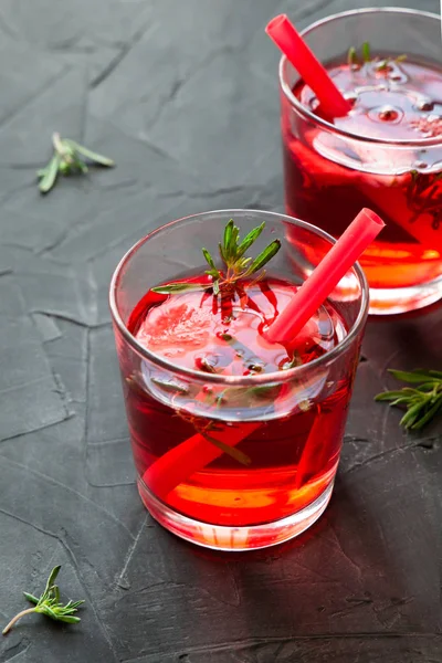 Summer refreshing cocktails with strawberry and thyme on a concrete background — Stock Photo, Image