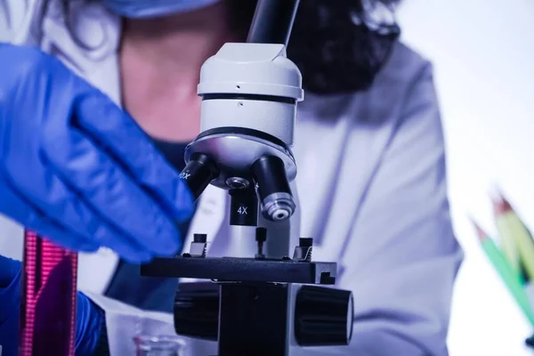 female lab technician doing research in the lab.