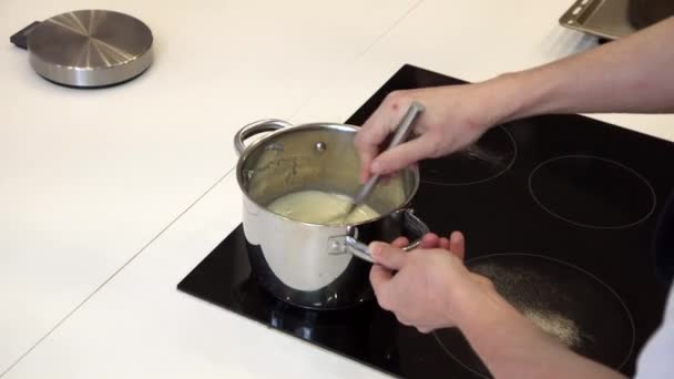 Mixing in a pan whisk close up — Stock Video