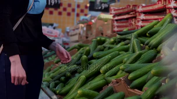 Girl, chopping, picking cucumbers close up — Stock Video