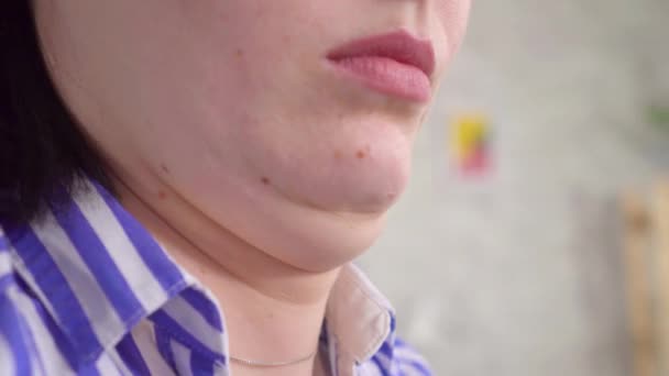 Close up double chin of a young woman — Stock Video
