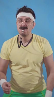 funny trainer freak with a mustache in the style of 80 uses a whistle on a blue background