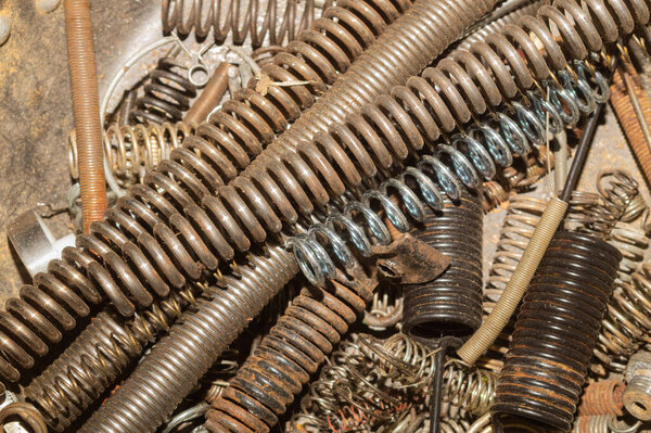 Metal rusty springs. pile of absorbers. industrial concept. work tool