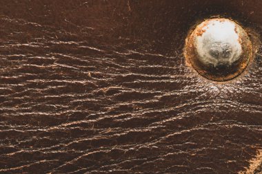 Kahverengi deri dokusu kapanıyor. kaba malzeme soyut arkaplan