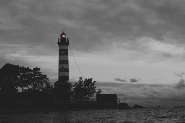 High Lighthouse Shines Shore Sunset Beacon Evening — Stock Photo, Image