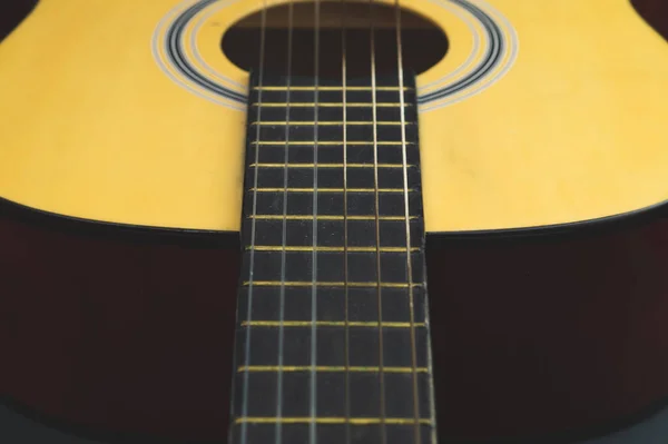 Acoustic guitar close up. musical instrument. strings on the guitar neck