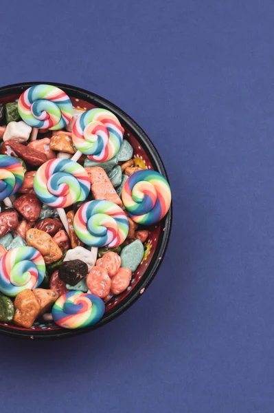 Lollipops and candies. candy bowl with sweets in the form of colored stones. copy space