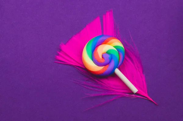 Lollipop Lies Feather Spiral Candy Colored Background Festive Decoration Copy — Stock Photo, Image