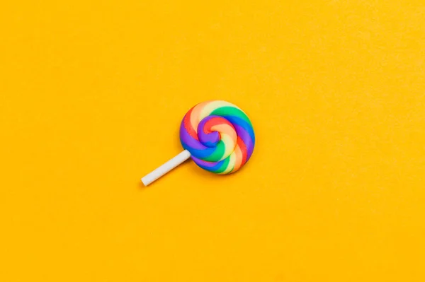 Lollipop Close Colorful Candy Yellow Background Spiral Caramel Copy Space — Stock Photo, Image