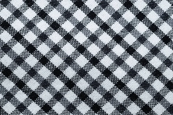 Kare şeklinde. Siyah beyaz kareli kumaş. Geometrik arkaplan