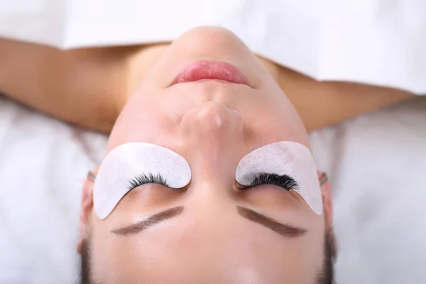 Eyelash Extension Procedure. Woman Eye with Long Eyelashes. Lashes, close up, macro, selective focus. — Stock Photo, Image