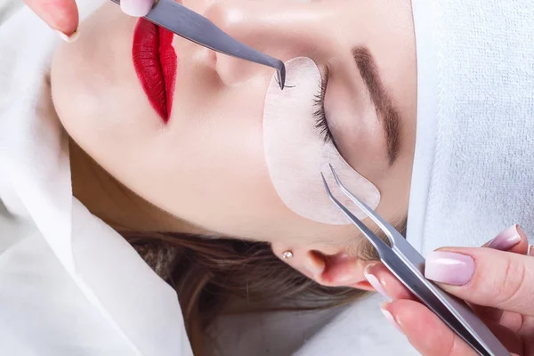 Eyelash Extension Procedure. Woman Eye with Long Eyelashes. Lashes, close up, selected focus. — Stock Photo, Image