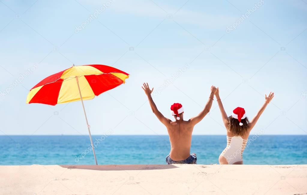 New year or christmas beach tropical concept with couple and