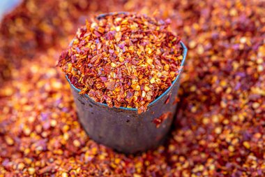 Red hot chili flakes in tin can, local fresh market