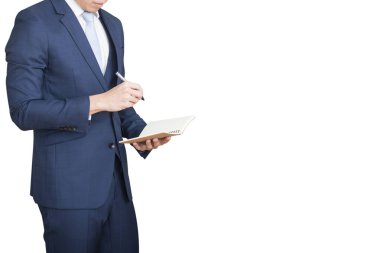 Defter üzerinde yazma iş adamı. Kırpma yolunu ve izole üzerinde beyaz arka plan ile.