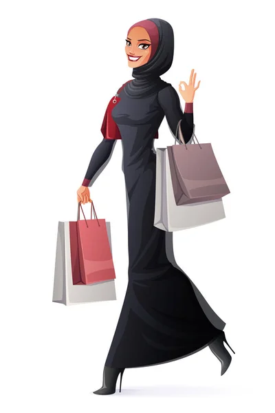 Muzułmanka wektor chodzenie z torby na zakupy i Wyświetlono Ok. — Wektor stockowy