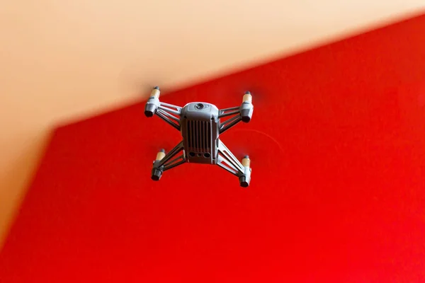 Close-up view under a flying mini drone