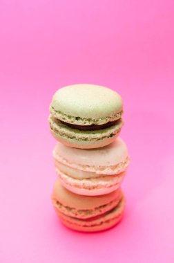 Seçim macaroons, pembe bir arka plan macaroons yakın çekim