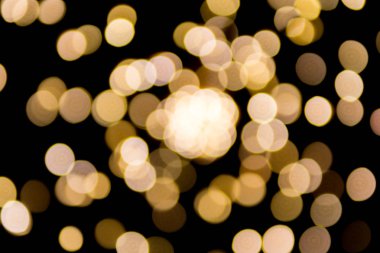 Siyah arka planlı soyut bulanık ışıklar