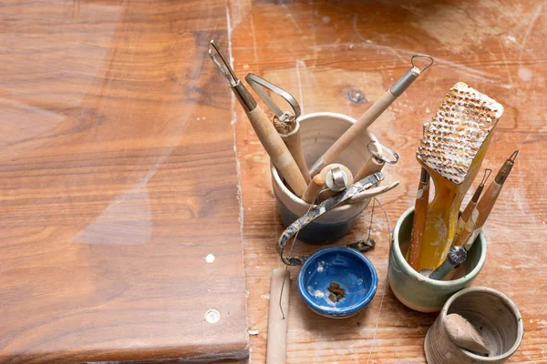 Pottery and ceramics tools for making art and sculpture in a workshop