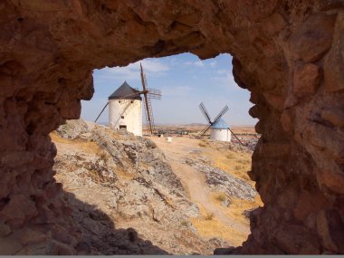 Famous landmark windmills of Don Quixote. Cosuegra, Spain clipart