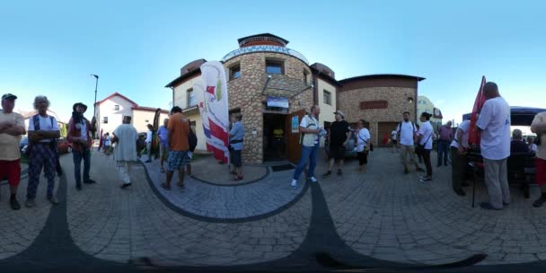 360Vr Video People at Kites Festival in Leba Poland Square Made of Paving Tiles Flags Advertisement Entertainment For Kids and Parents Families Together — Stock Video