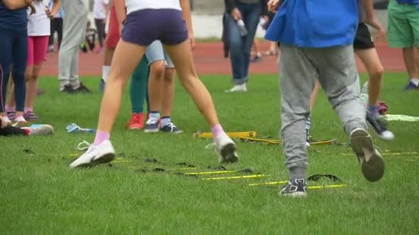 Teacher Has Forced Children to Jump on a Lawn — Stock Video