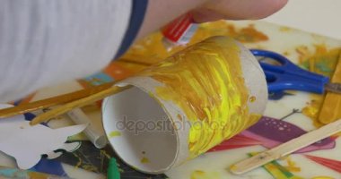 Moms Hands Rolling Up A Paper Cylinder Falimy Kid And Parents Are Making Toys Giraffes Moms Hands Rolling Up A Paper Cylinder Falimy Kid And Parents Are Making Toys Giraffes