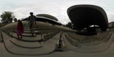 360Vr Video 360 Degrees, Happy Family, Father and Daughter in Empty Theatre Are Taking the Video Using a Selfie Stick and Running Along the Rows. Millennium Amphitheatre in Opole, Exterior. Spherical Panorama. Mom, Woman is Sitting on a Set