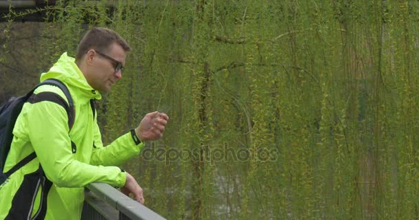 Man Extracts From His Pocket a New Tablet — Stock Video