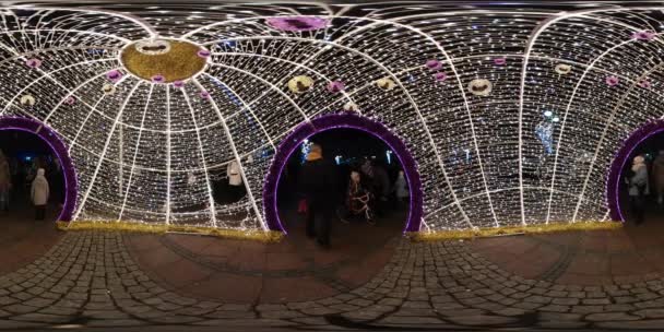 360Vr Video Saint Nicholas' Day in Opole Poland People Walk Through Arch of Lights Moms Dads and Kids Girl on Bicycle Families Spend Evening Together — Stock Video
