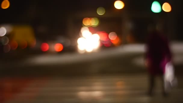 Man Crossing Road Going to Take Bus Night Cityscape Blurred Cars and People Silhouettes Everyday Life of Modern City End of Workday Safety Traffic — Stock Video