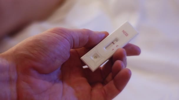Cropped Hands Holding Pregnancy Test — Stock Video