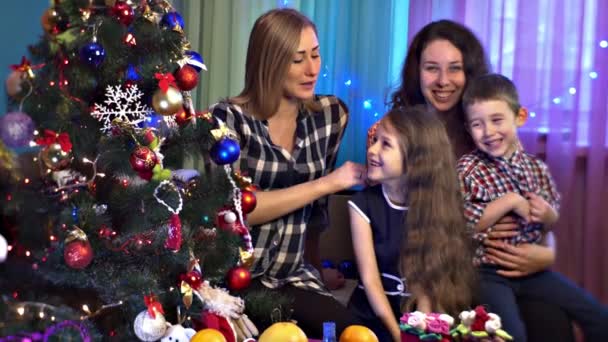 Fair-Haired Woman Straightens up Hair of Daughter — Stock Video