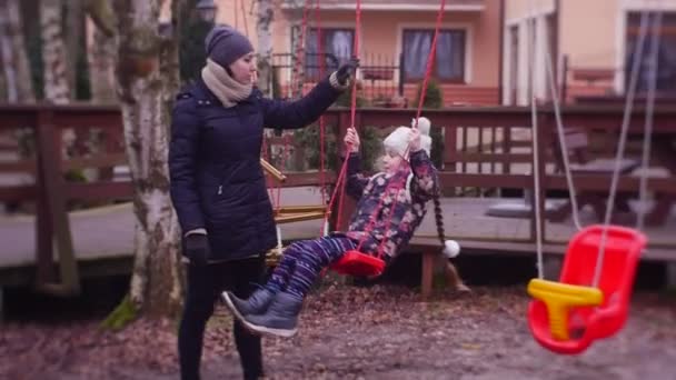 Little Girl Swinging Swing Mother Daughter Spend Time Together Playground — Stock Video