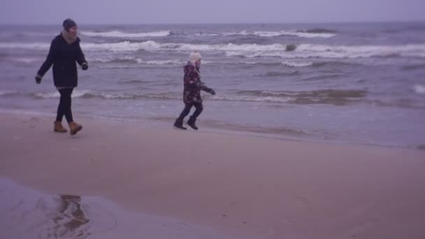 Mother Daughter Walking Sea Coast Cold Weather — Stock Video