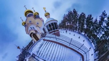 Tiny Little Planet. Coniferous Forest, Sky Over Orthodox Church. Spherical Video, Panorama Video, Time Lapse. Its Getting Dark on the Square, Light Comes From Church