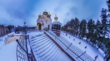 Tiny Little Planet. Coniferous Forest, Sky Over Orthodox Church. Spherical Video, Panorama Video, Time Lapse. Its Getting Dark on the Square, Light Comes From Church
