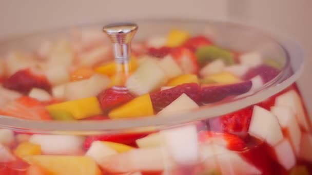 Beautiful Wine Glass With a Frozen Fruit — Stock Video