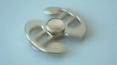 Yavaş spinner oyuncak bir Doları closeup şeklinde iplik