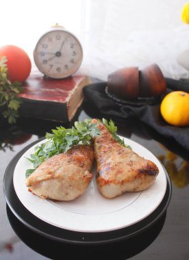 Roasted chicken legs stuffed with carrot and mushrooms clipart
