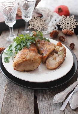 Roasted chicken legs stuffed with carrot and mushrooms clipart