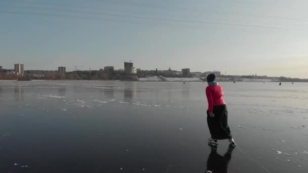 Girl Skates Ice Large Reservoir Backdrop Industrial City — Stock Video