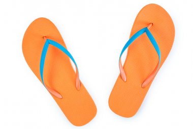 Beyaz arka planda izole edilmiş turuncu parmak arası terlikler. Üst Görünüm