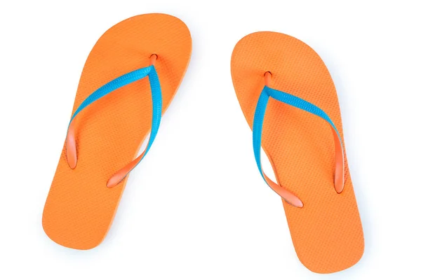 Orange Flip Flops geïsoleerd op witte achtergrond. Bovenaanzicht — Stockfoto