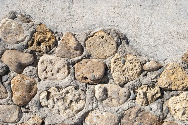 Antiguo muro de granito de piedra beige —  Fotos de Stock